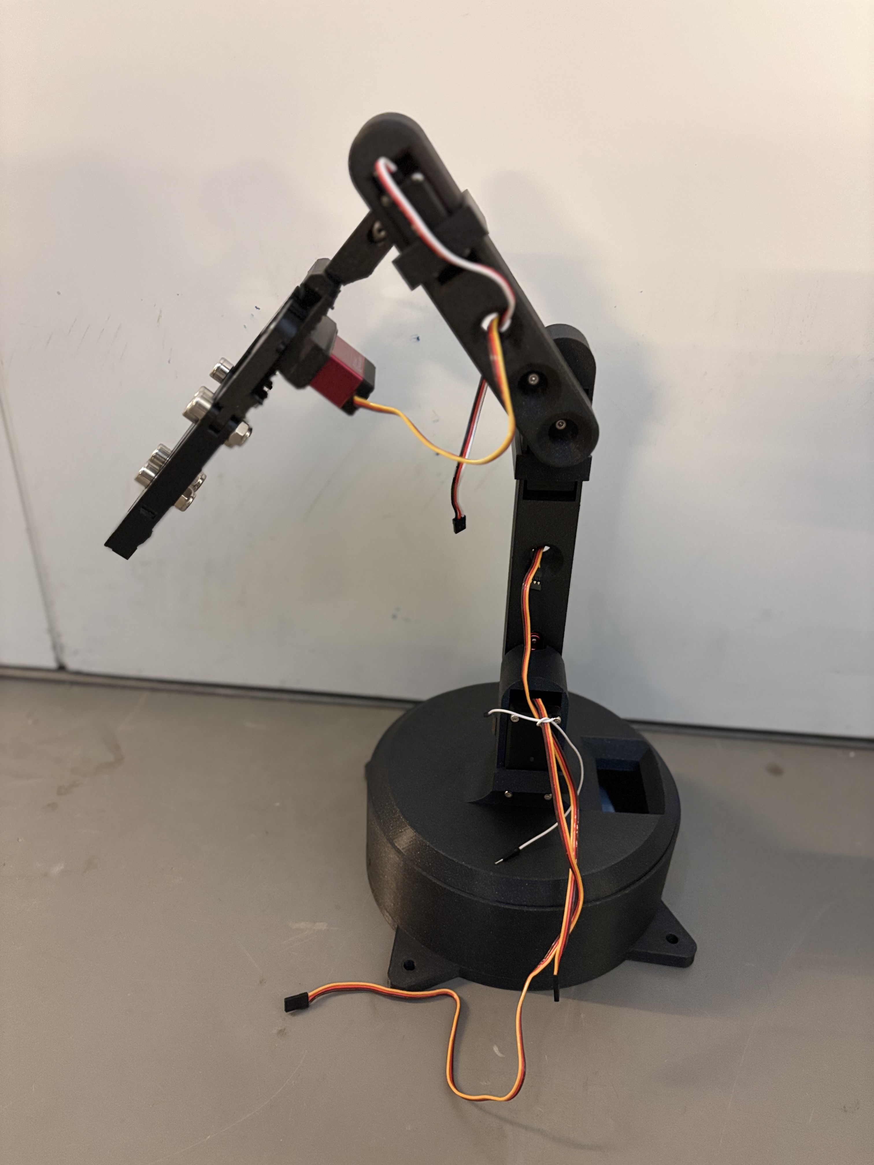 5-DOF 3D-printed robotic arm with servo motors and a Raspberry Pi camera